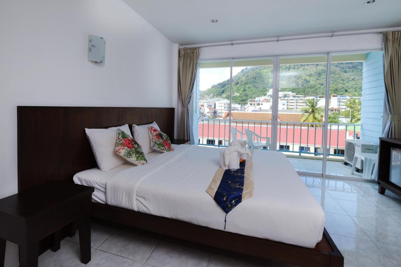 Kiwi Boutique Hotel Patong Exterior photo