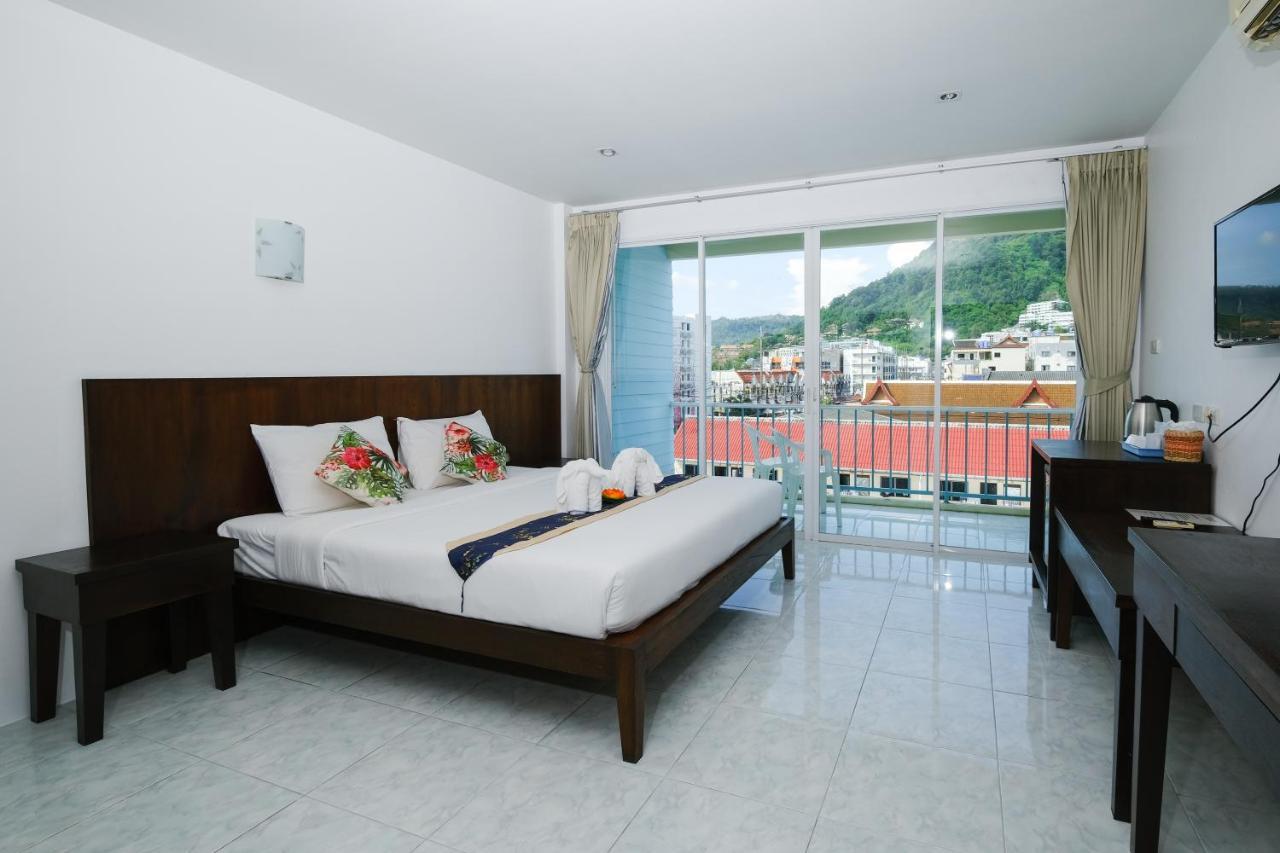 Kiwi Boutique Hotel Patong Exterior photo