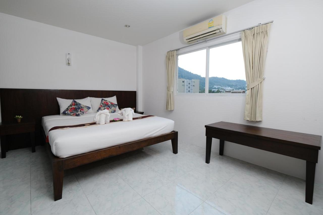 Kiwi Boutique Hotel Patong Exterior photo